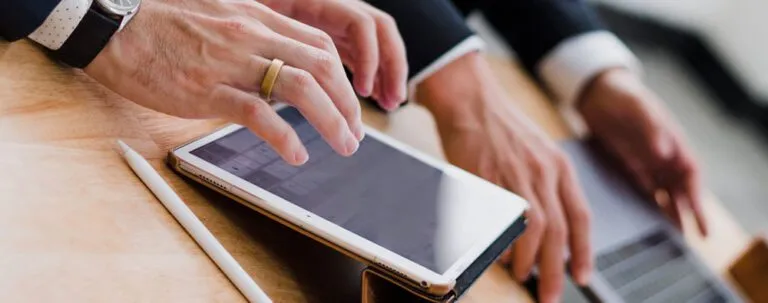 Person Using Tablet for Cyber Security